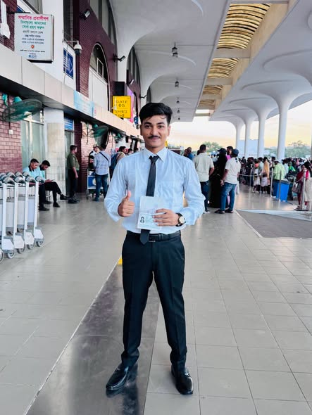Sakura JLTC male student at airport with passport